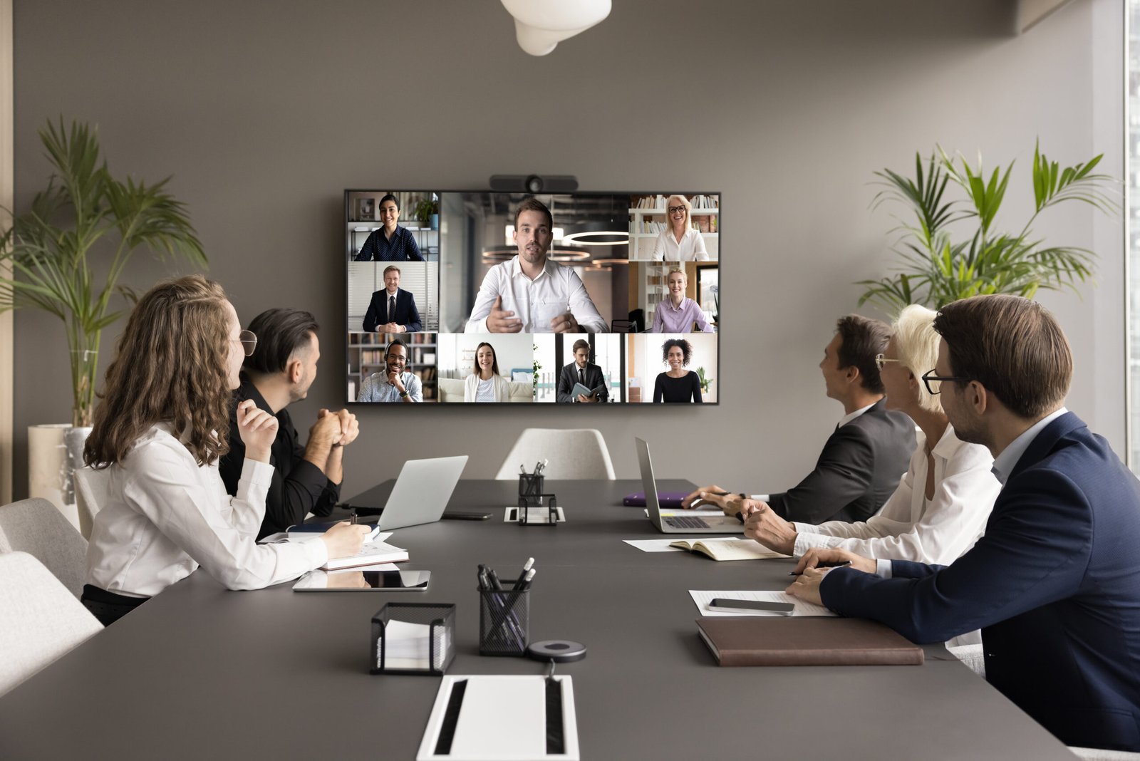 office employees and freelancers meeting on online video chat